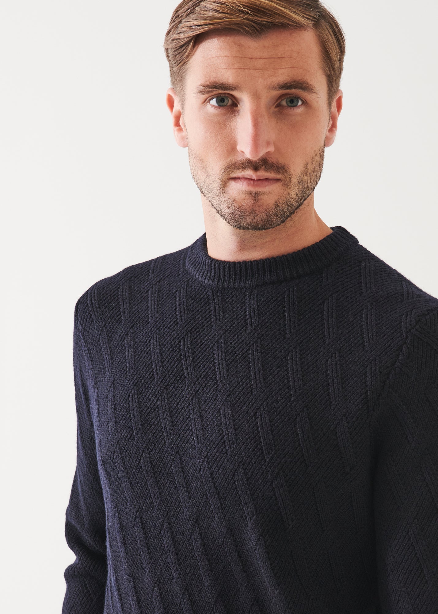 MERINO CABLE KNIT SWEATER